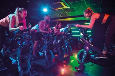 People in a cycling class at a David Lloyd club