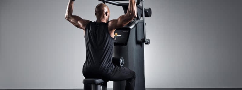 Image of man using EGYM machine