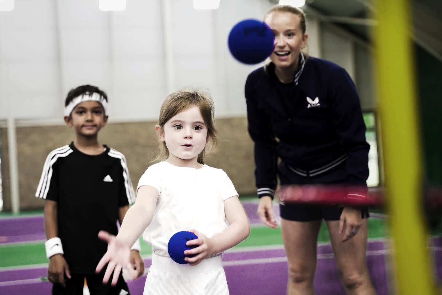 Kids playing tennis