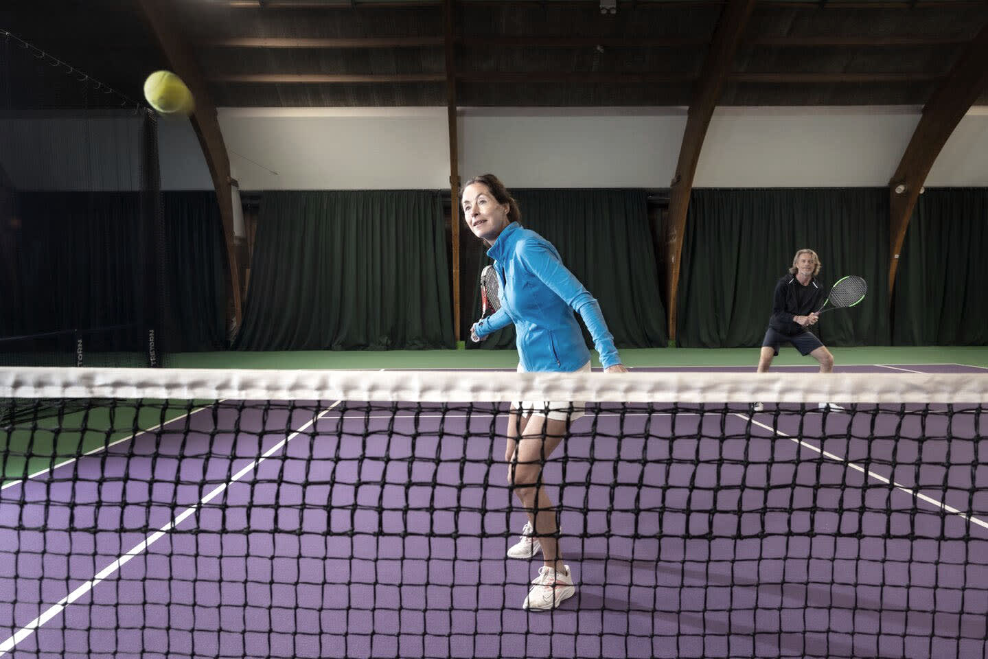 A woman hitting a tennis ball