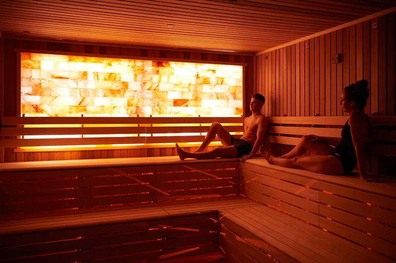 People relaxing in a sauna