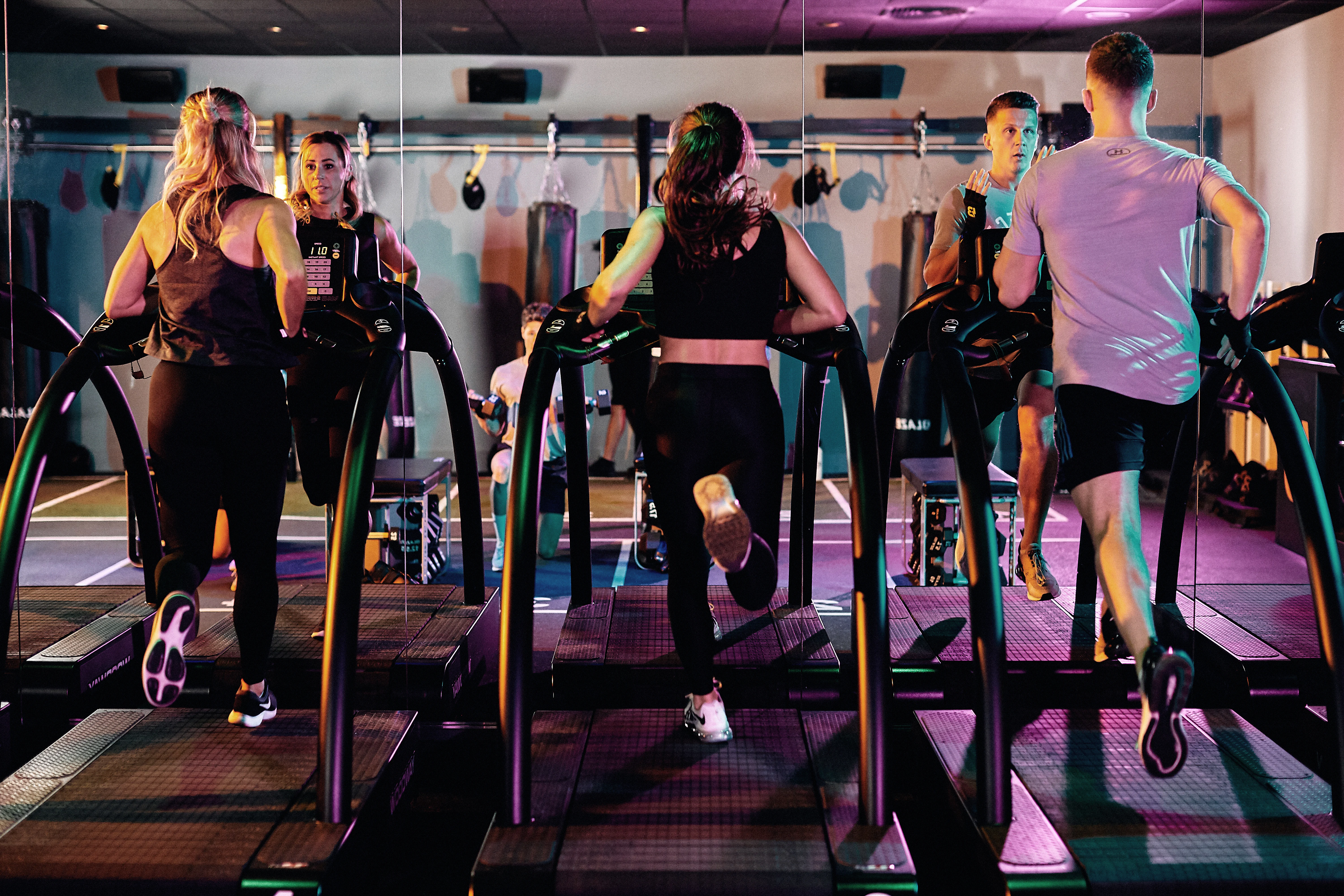 Running on the treadmill during a David Lloyd Clubs BLAZE class