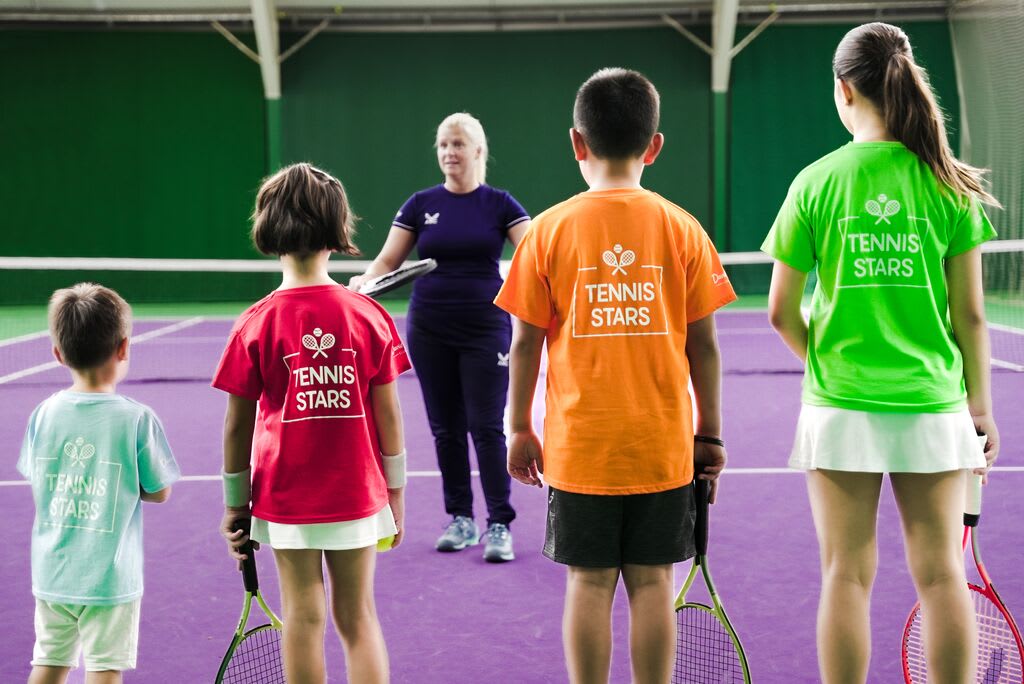 Kids playing tennis